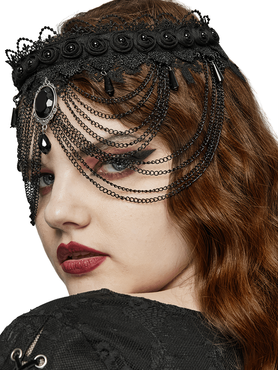 Gothic black lace and chain choker for women with gemstone pendant, creating a bold statement accessory.