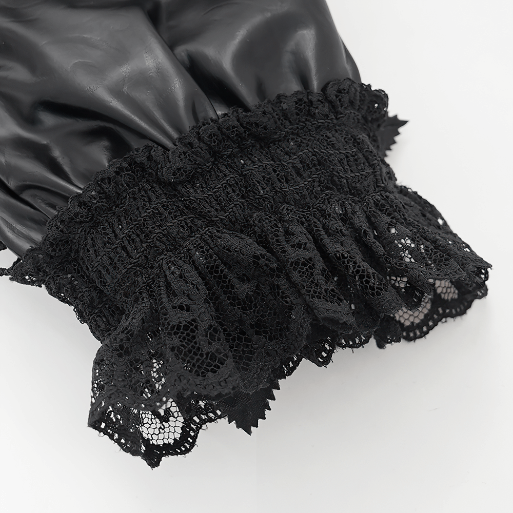 Close-up of Gothic black gloves with satin roses and lace ruffle cuffs for a vintage fashion statement.