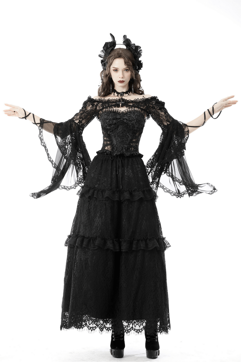 Gothic black lace off-the-shoulder bolero with bell sleeves, paired with a dramatic long dress for a stunning look.