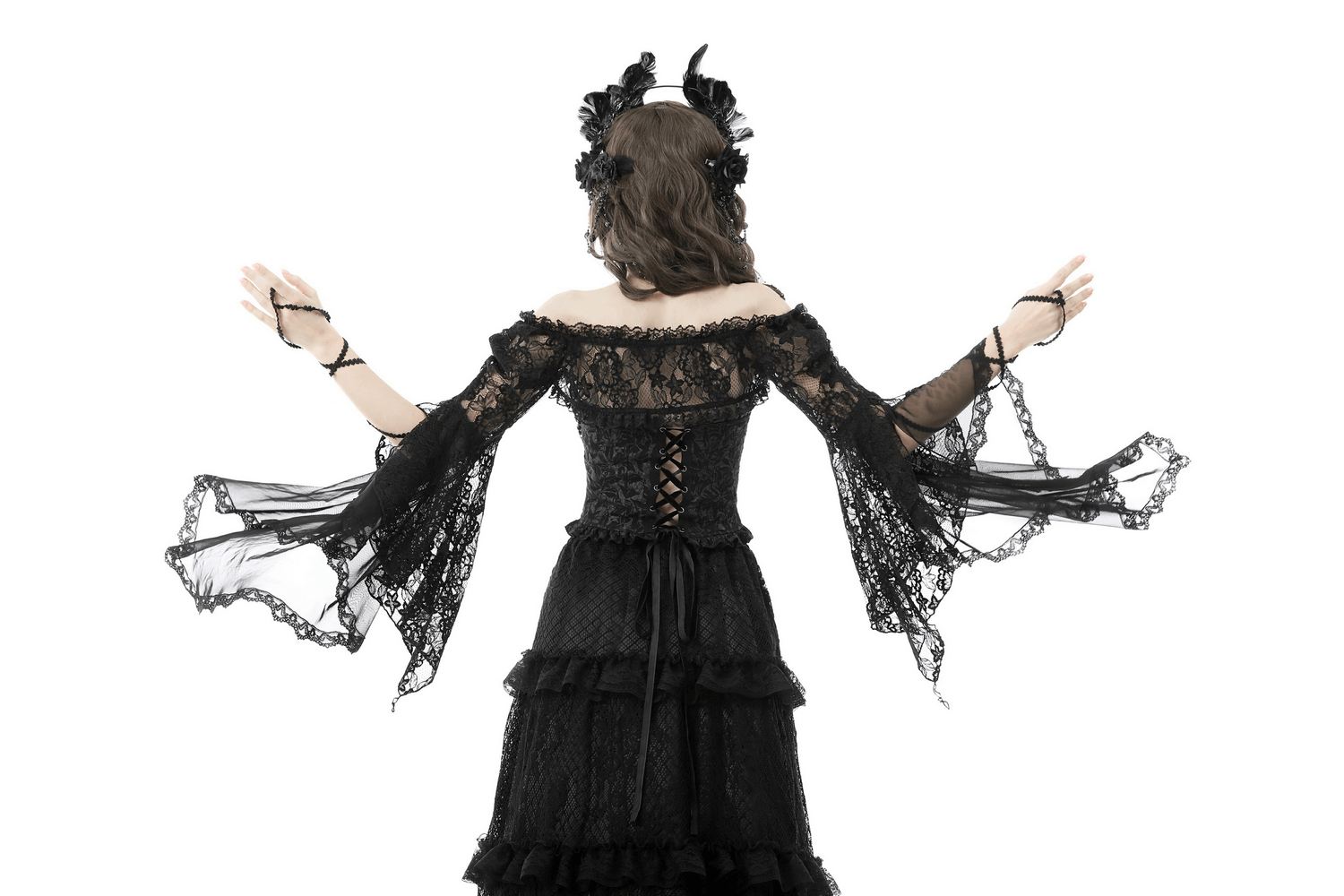 Woman wearing Gothic Black Lace Bell Sleeve Off-the-Shoulder Bolero with dramatic sleeves and intricate lace detailing.