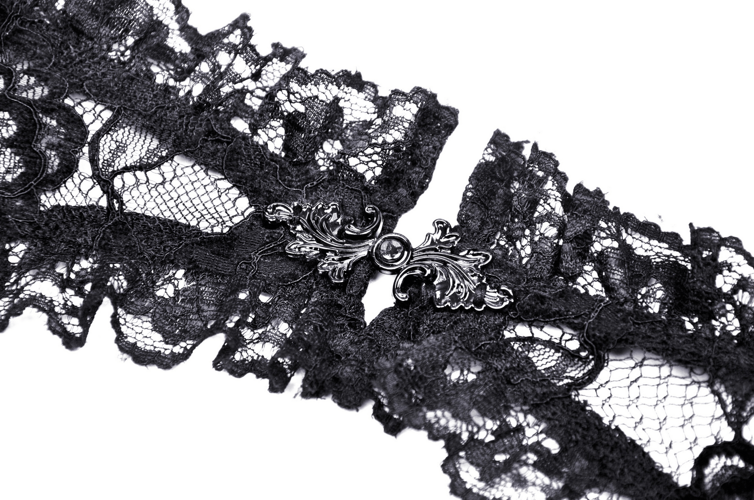 Intricate black lace with a decorative clasp, perfect for gothic fashion styles and elegant outfits.