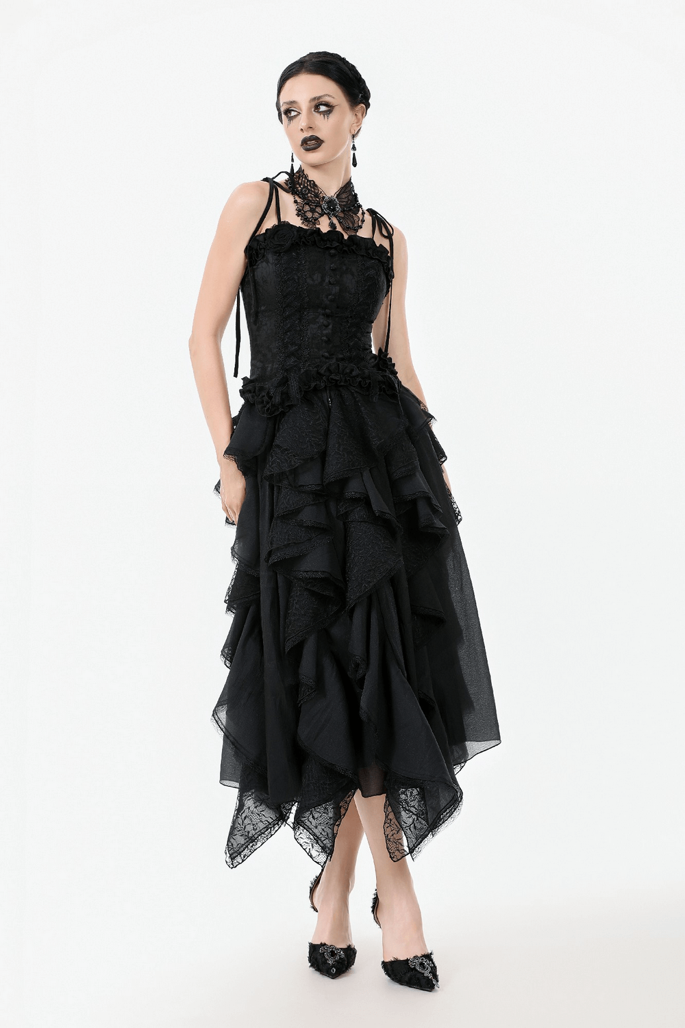 Gothic black lace dress with ruffled skirt and intricate detailing, perfect for alternative fashion enthusiasts.