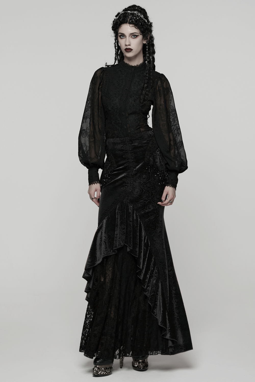 Gothic Black Lace Chiffon Blouse with Corset Back on model featuring dramatic puffed sleeves and lace details.