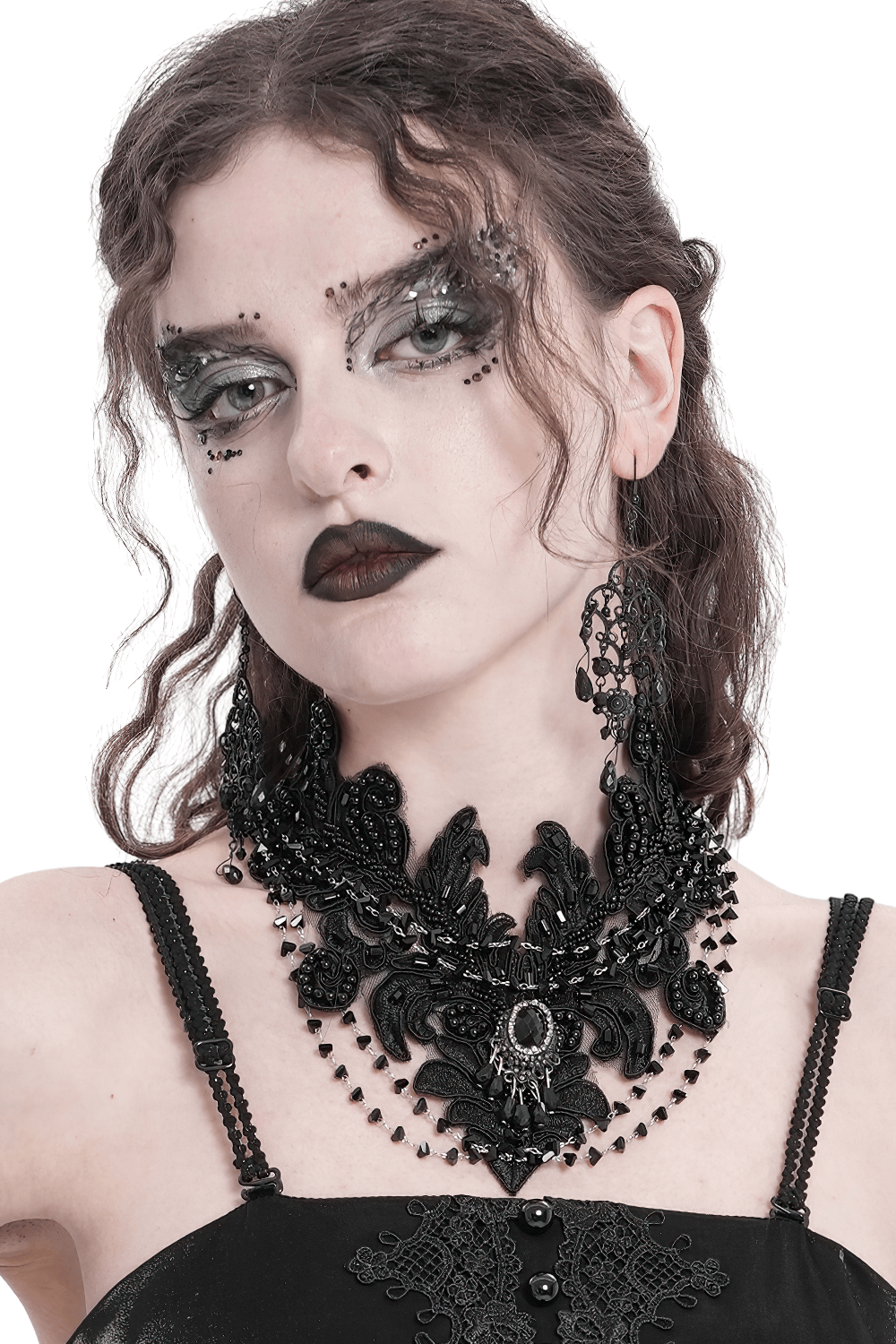 Gothic black lace choker necklace with beaded chains and black gem pendant, perfect for a Victorian-inspired look.