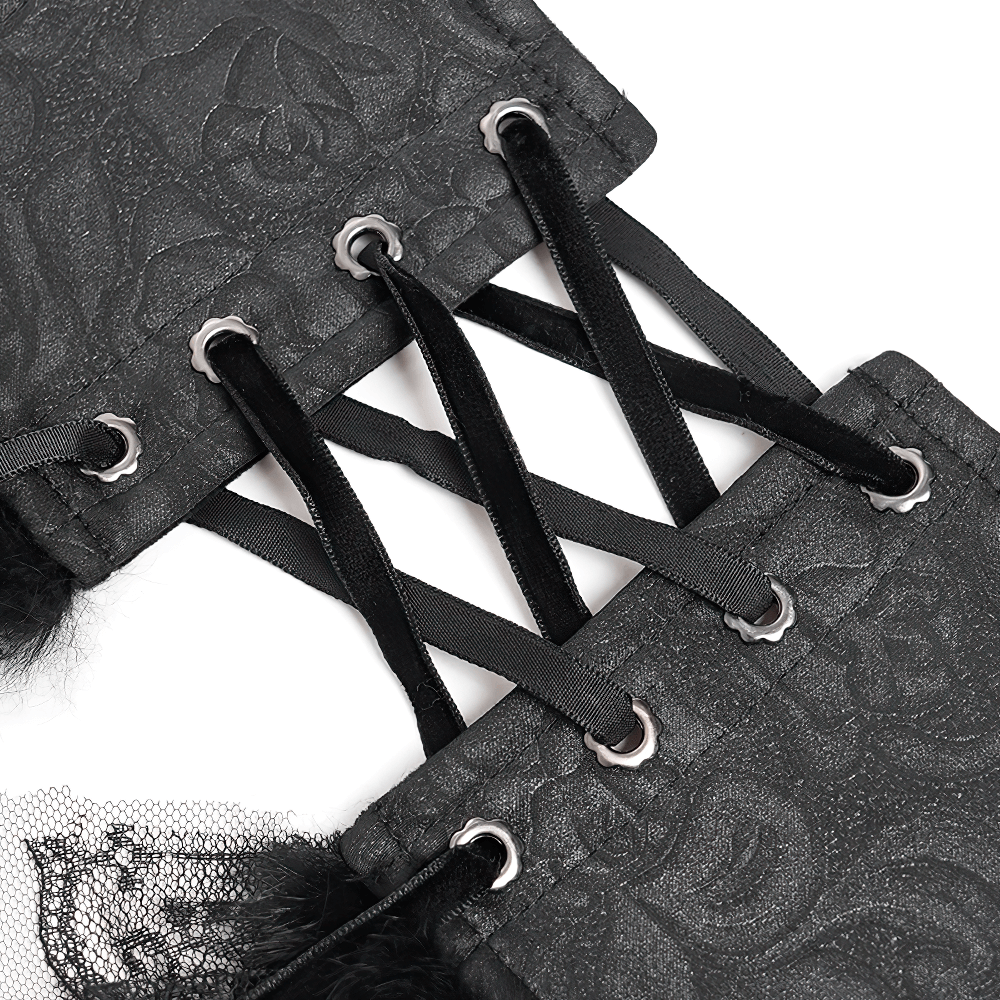 Close-up of the intricate lacing on a gothic black lace corset belt with a floral texture and decorative trim.