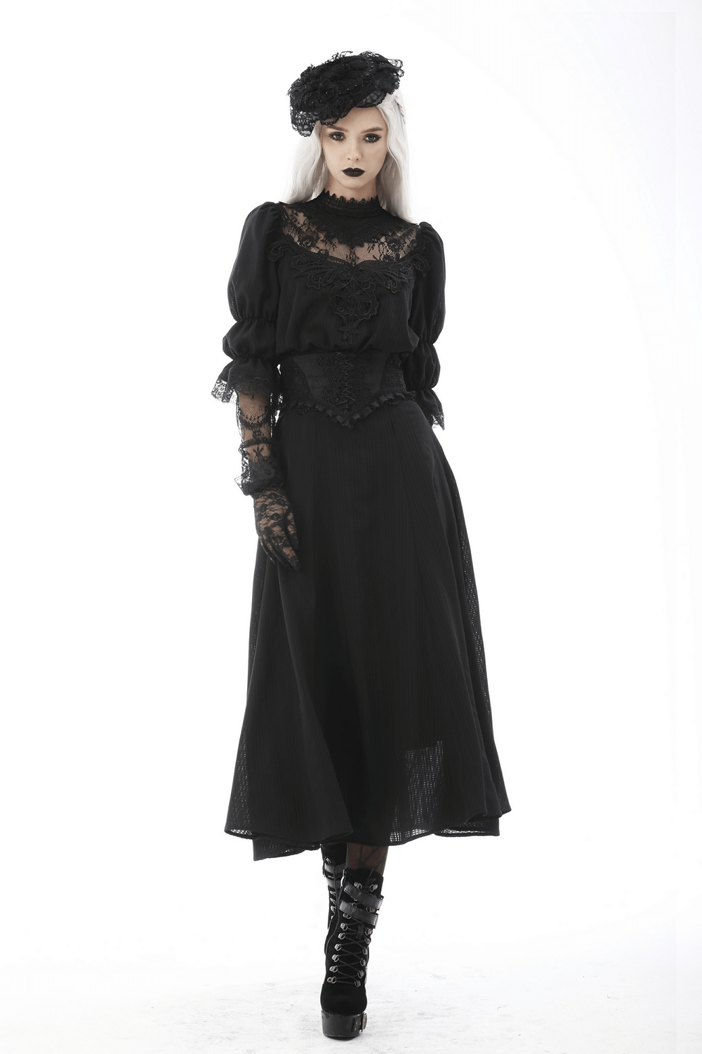 Elegant model in a gothic black lace corset belt, Victorian dress, and dramatic hat, showcasing dark fashion aesthetic.