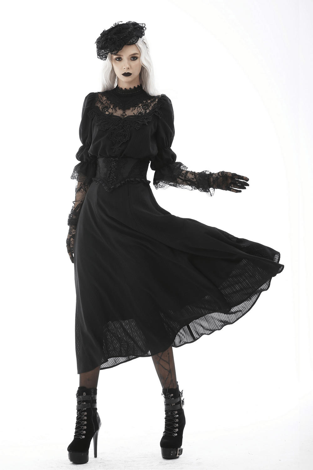 Gothic model wearing a black lace corset belt and elegant dark dress, showcasing dramatic Victorian style.