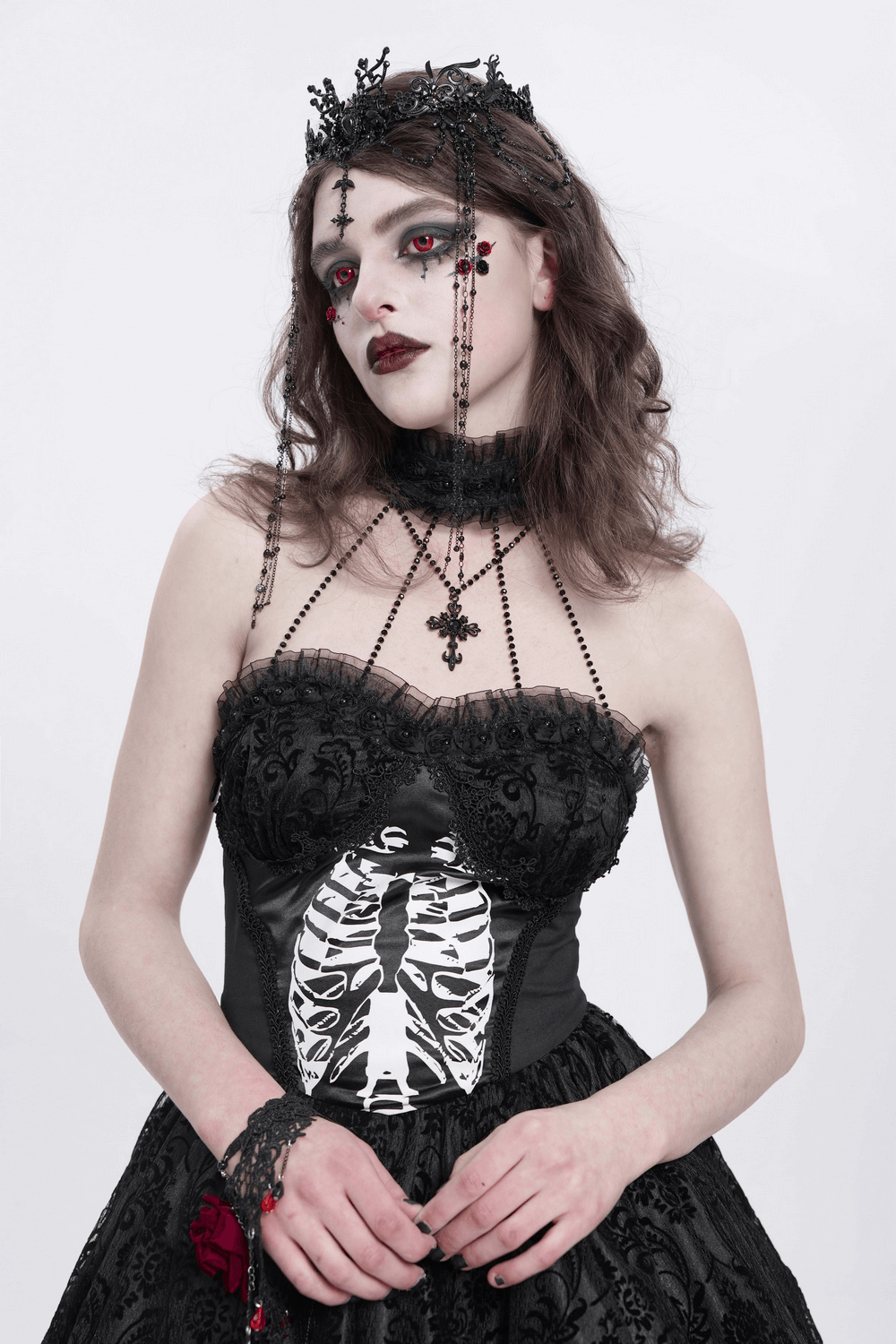 Model wearing gothic black lace crown with chains and cross details, showcasing a dark, dramatic style.
