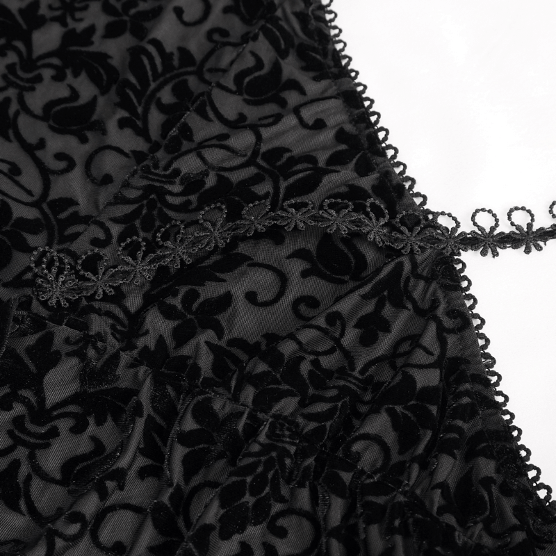 Close-up of Gothic black lace fabric with elegant floral patterns and delicate trim for a seductive nightdress.