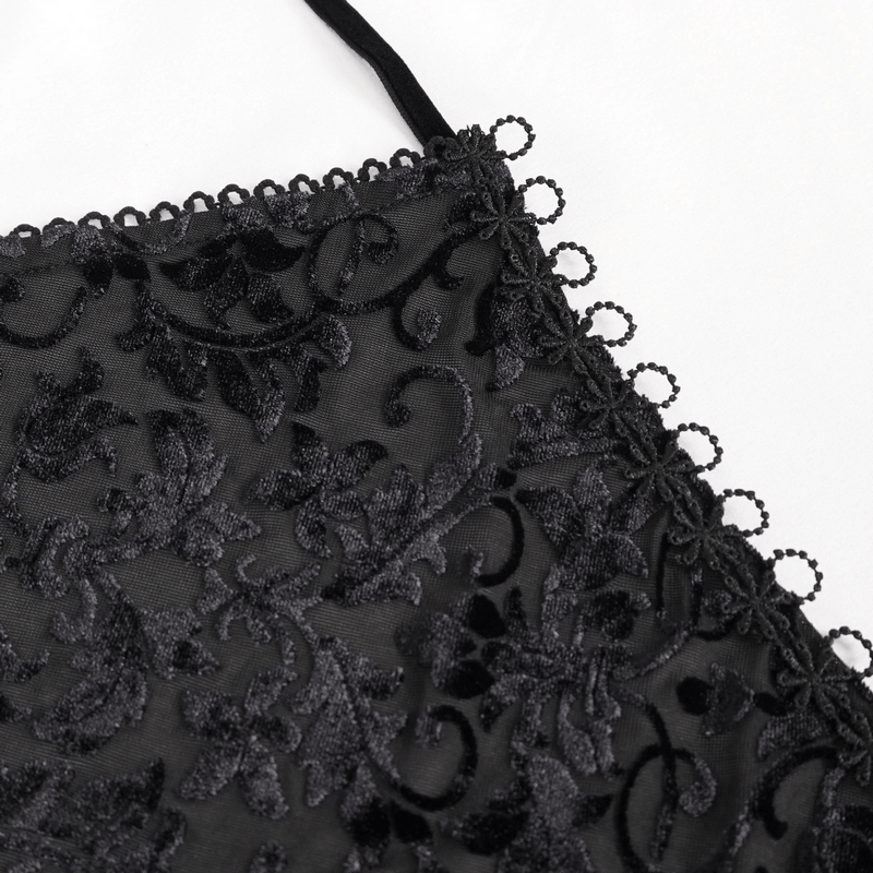 Close-up of elegant black lace fabric with intricate floral patterns for a gothic deep V-neck dress.