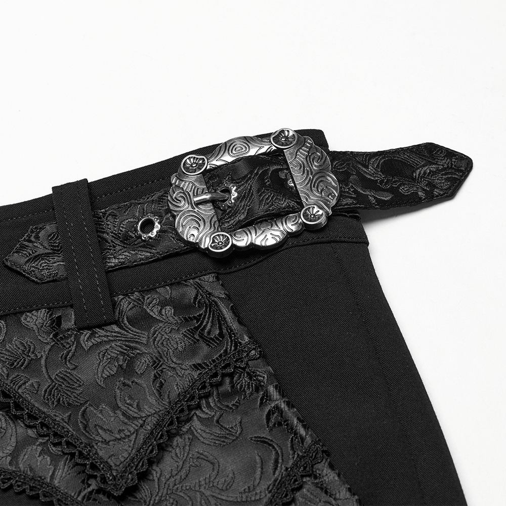 Close-up of Gothic black trousers with elegant lace details and adjustable buckle waistband for a stylish fit.