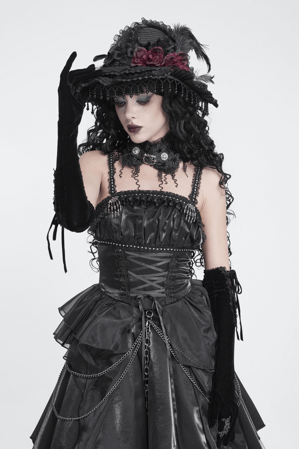 Gothic Black Lace Floral Choker with Silver Clasps styled with a dramatic black dress and accessories, showcasing dark romantic elegance.