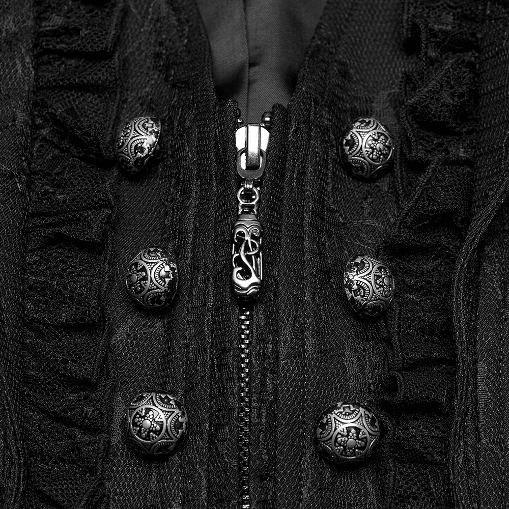 Close-up of engraved buttons and ruffle detailing on a gothic black lace waistcoat.