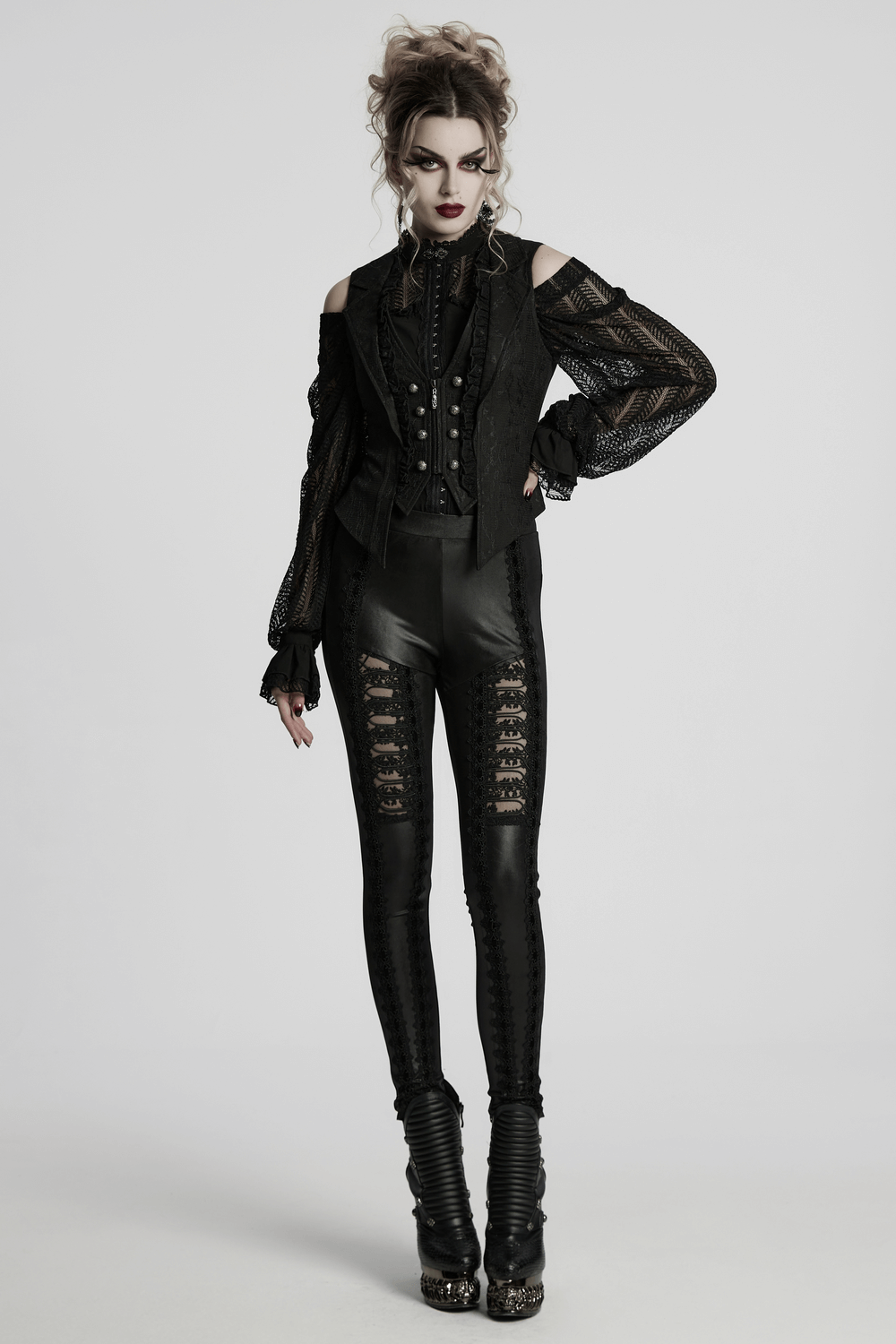Gothic black lace lapel waistcoat with engraved buttons and stylish leather leggings, showcasing a bold goth look.