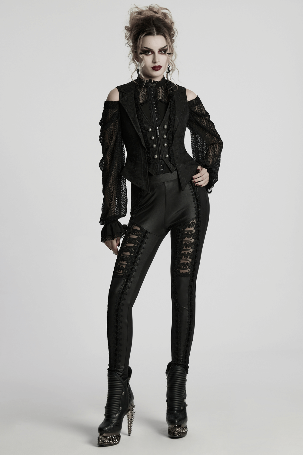 Gothic black lace lapel waistcoat paired with edgy leggings, showcasing a bold goth academy style.