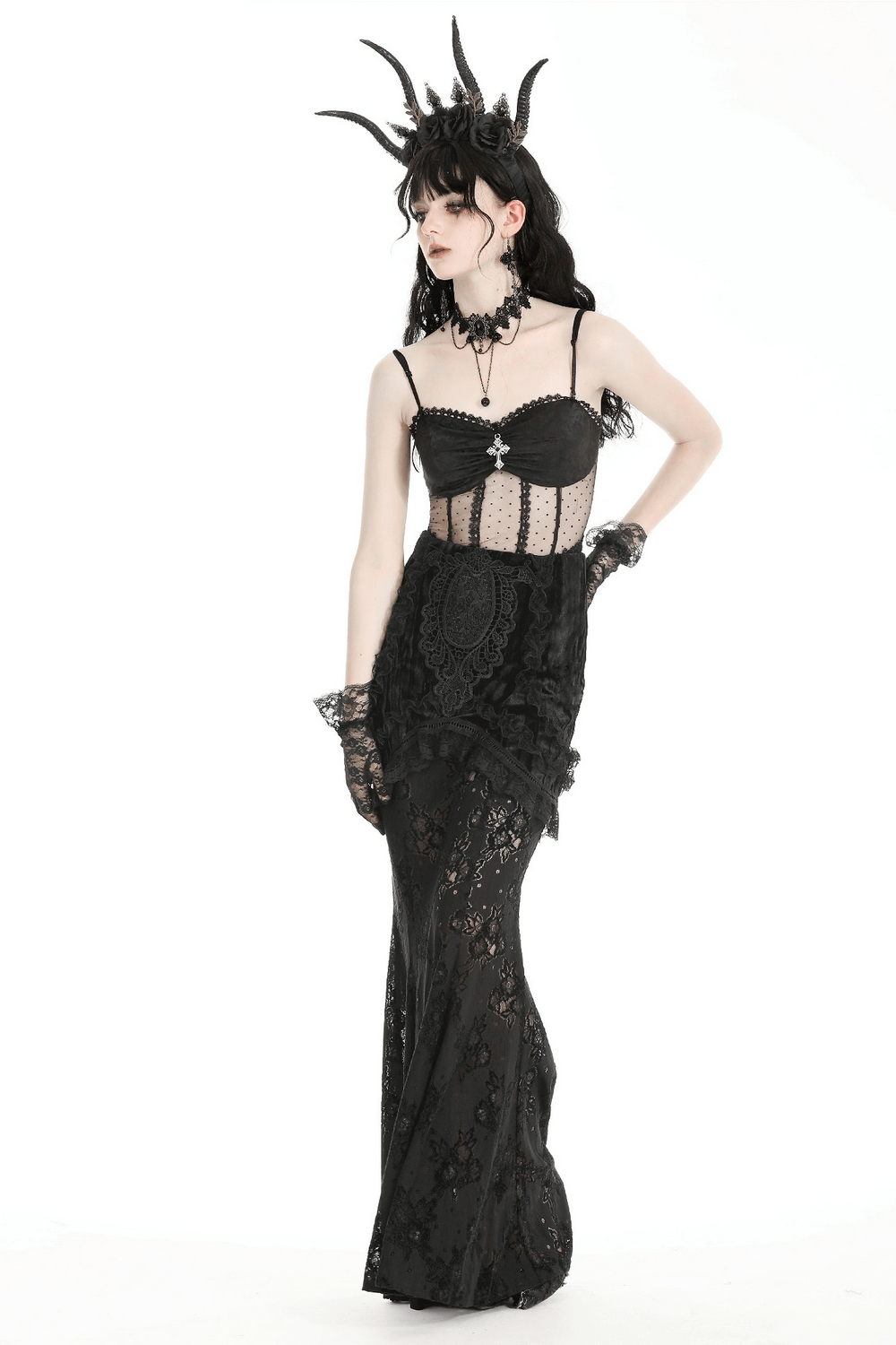Elegant woman in a Gothic black lace layered long skirt, showcasing intricate design and a touch of mystery.