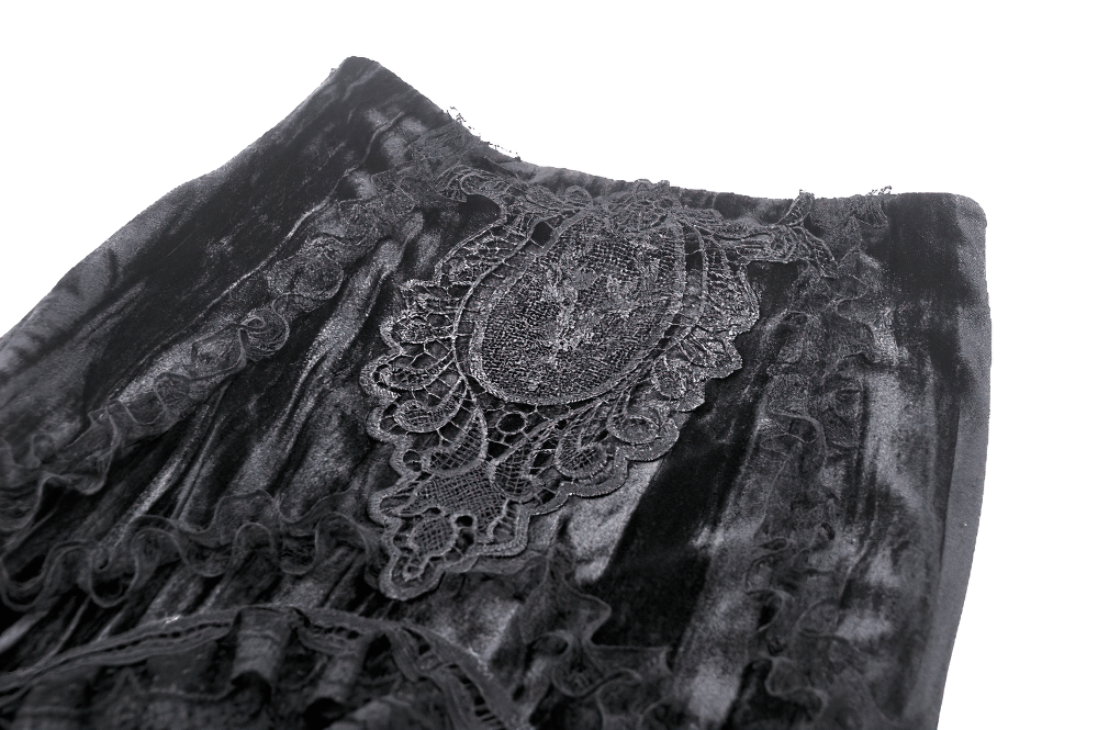 Close-up of elegant Gothic black lace detailing on a layered long skirt for women, showcasing intricate patterns.