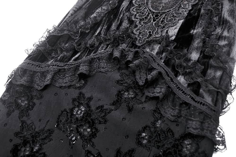 Close-up of a Gothic black lace layered skirt showcasing intricate lace detailing and elegant design.