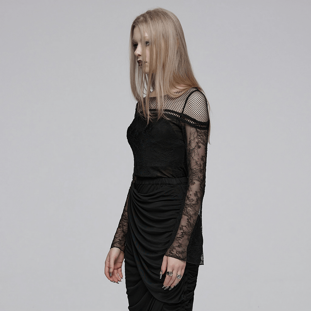 Model in Gothic black lace long sleeve top with mesh panels and flared sleeves, showcasing an elegant yet edgy style.
