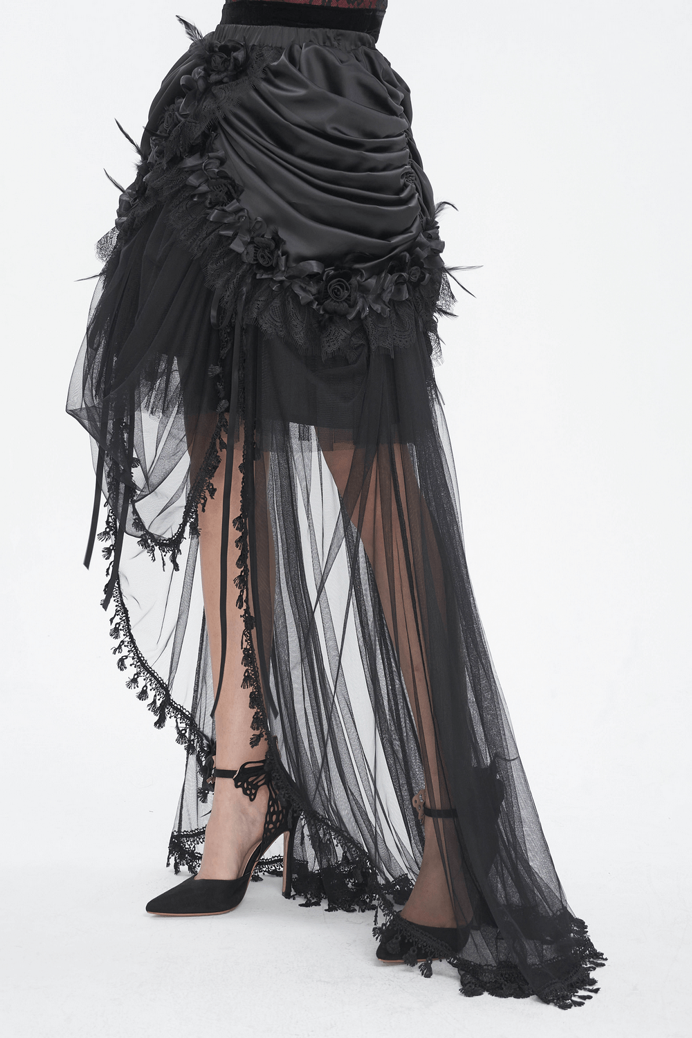 Elegant gothic black lace maxi skirt with satin lining, ruffled hem and floral accents, perfect for evening wear.