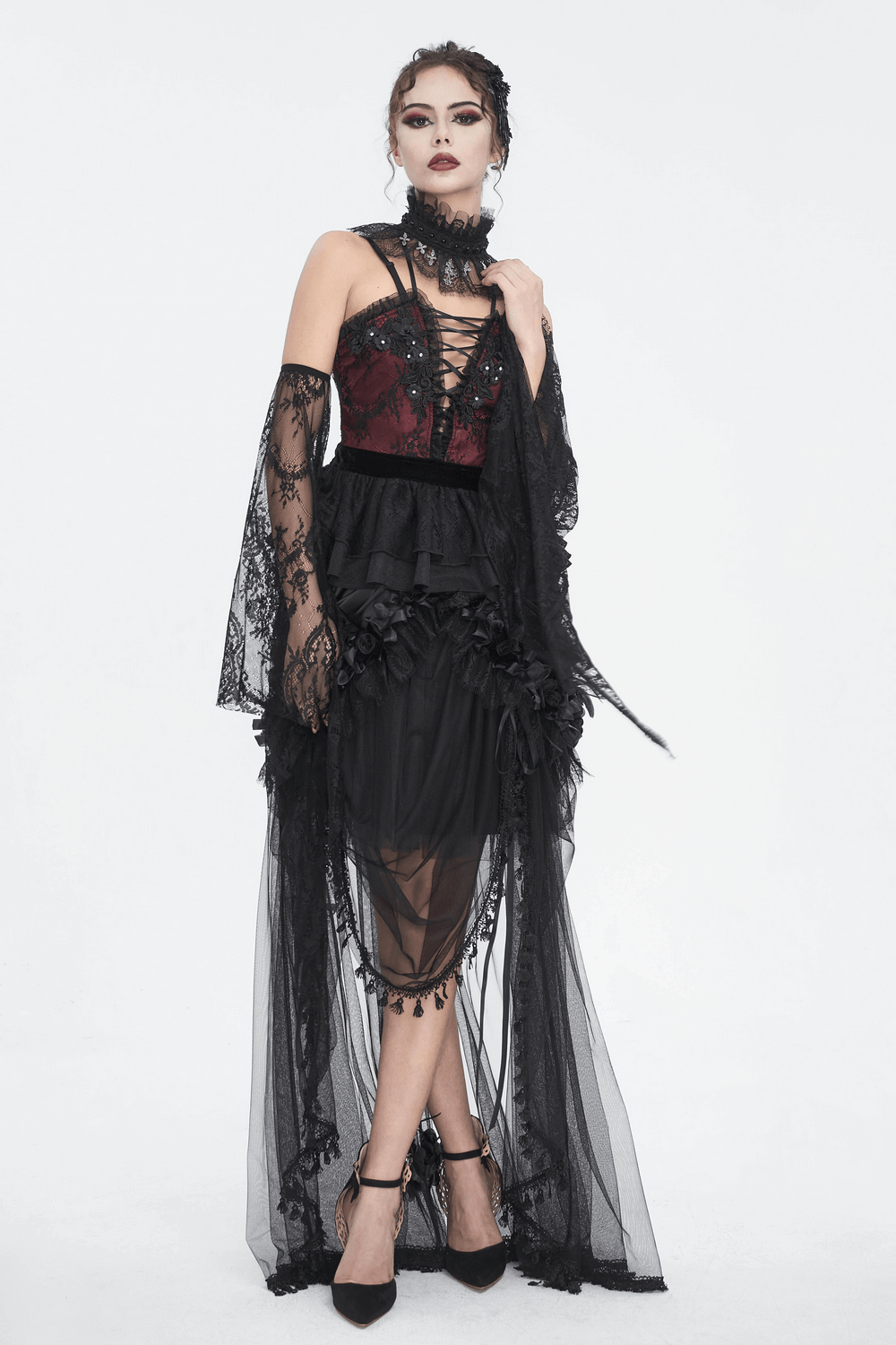 Gothic black lace maxi skirt featuring satin lining and intricate ruffles, perfect for elegant evening looks.