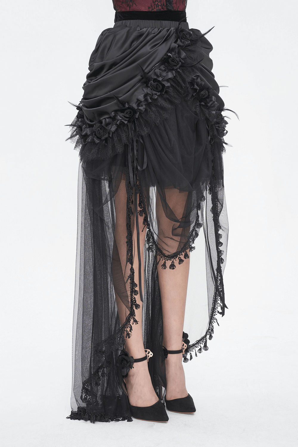 Gothic black lace maxi skirt with satin lining and intricate ruffles for an elegant evening look.
