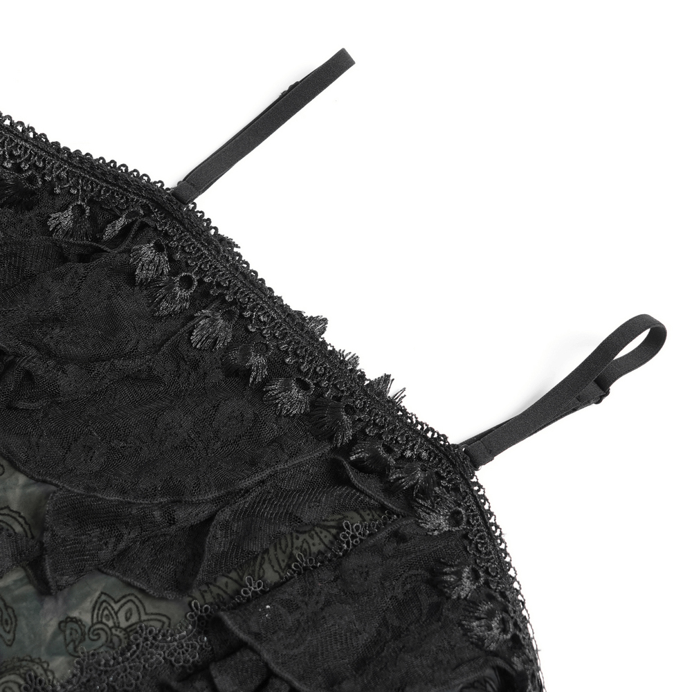 Close-up of adjustable straps and intricate floral lace detailing on a Gothic black lace top.