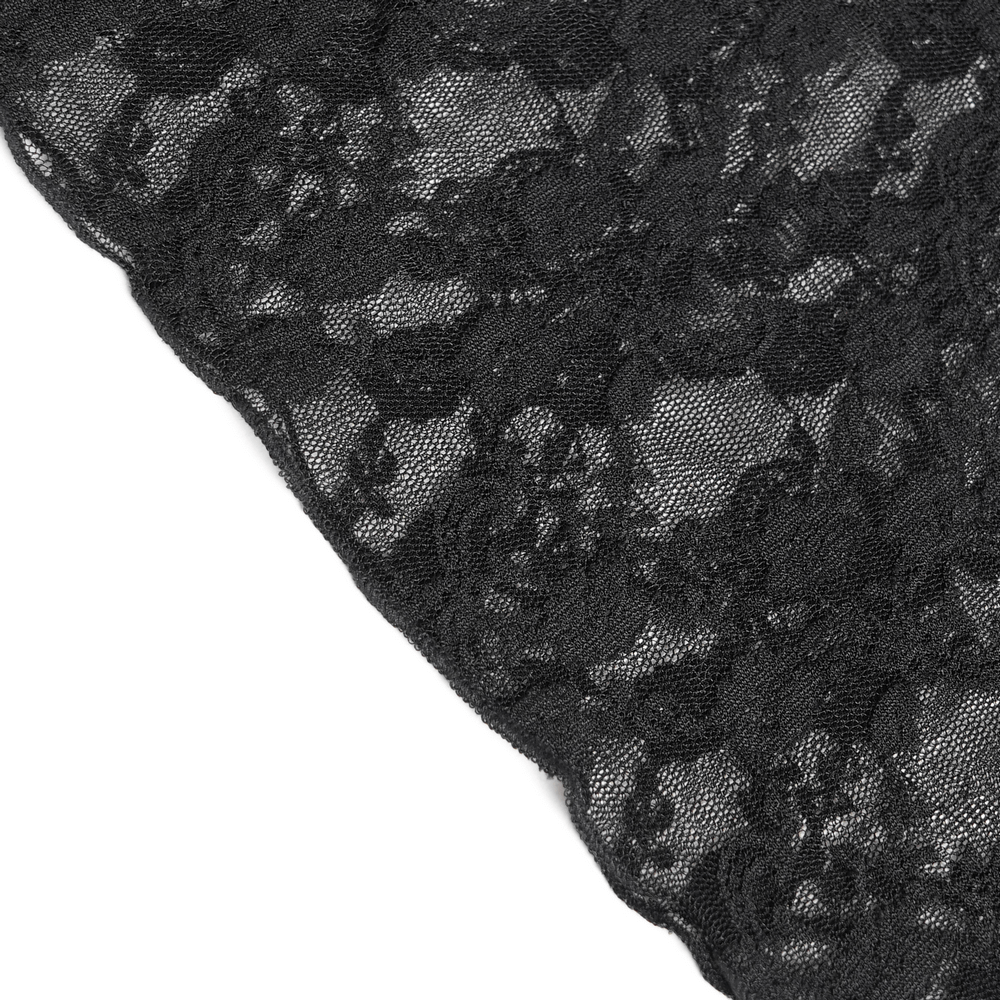 Close-up of romantic black lace fabric with floral patterns, perfect for gothic-inspired fashion.