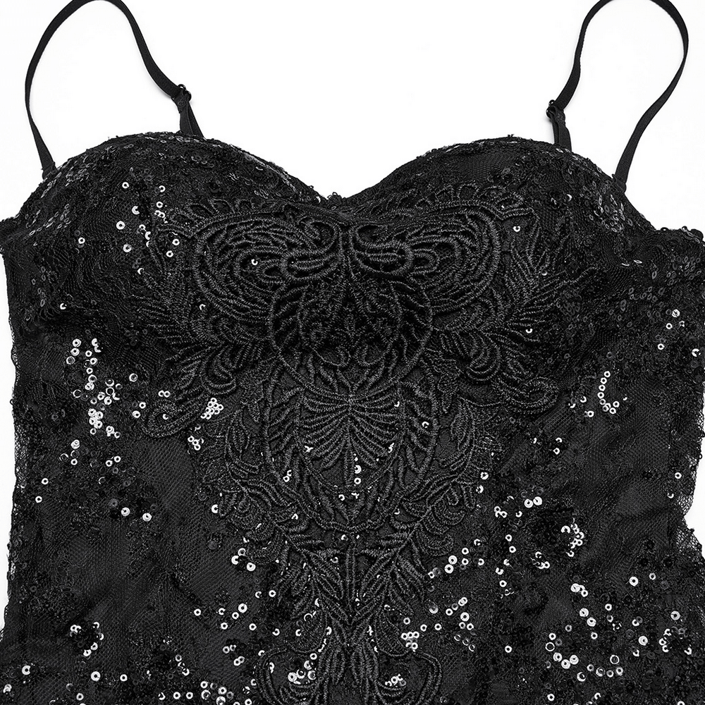 Close-up of Gothic black lace dress featuring intricate sequins and bead accents for elegant flair.