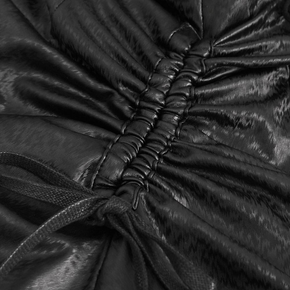 Close-up of the black lace-up detail on a gothic dress, showcasing intricate stitching and fabric texture.