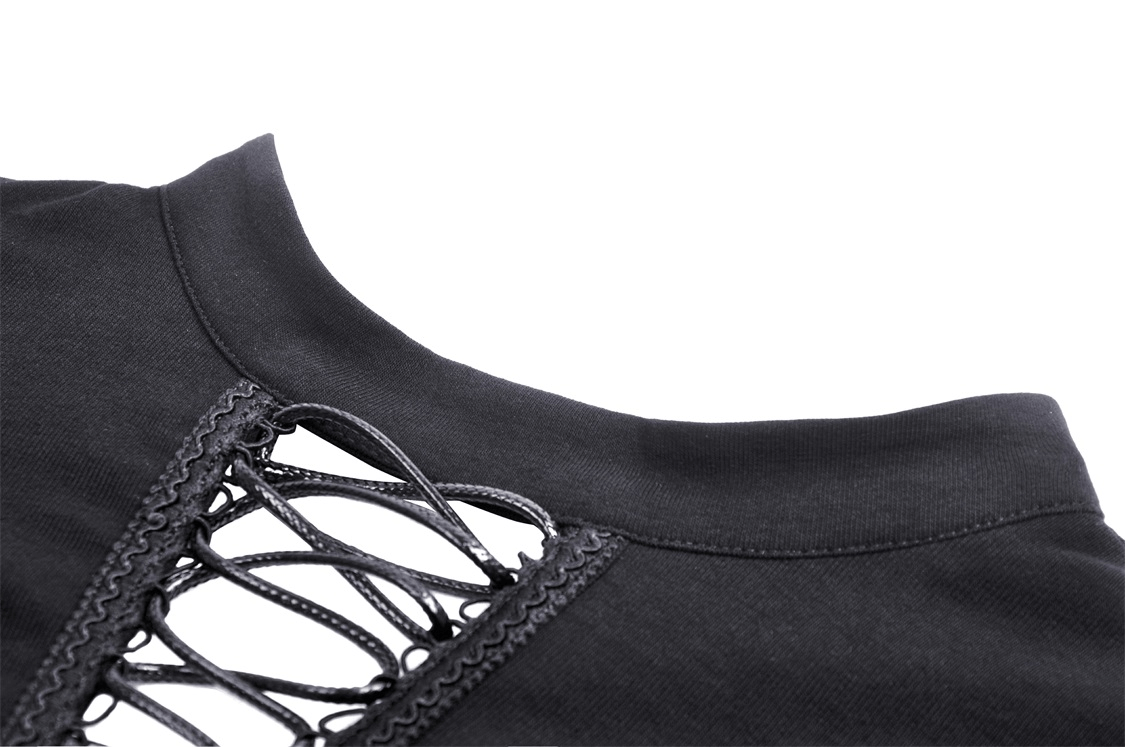 Close-up of gothic black lace-up crop top with intricate cut-out back design and strappy shoulder details.