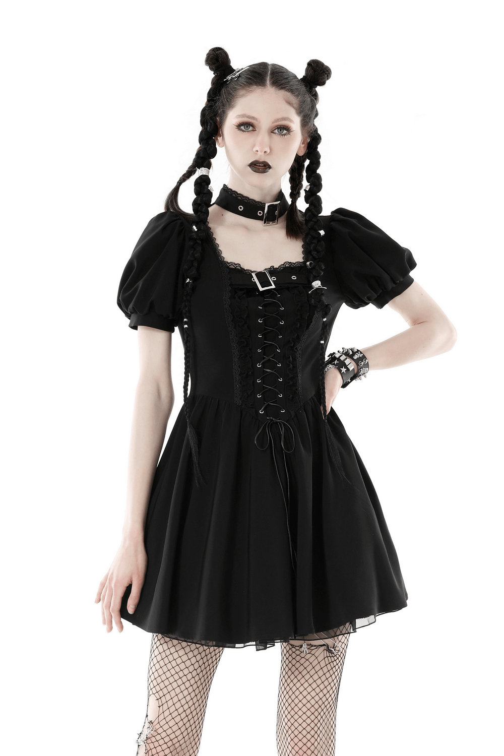 Gothic black lace-up dress with puff sleeves, choker, and fishnet tights for a dark aesthetic look.