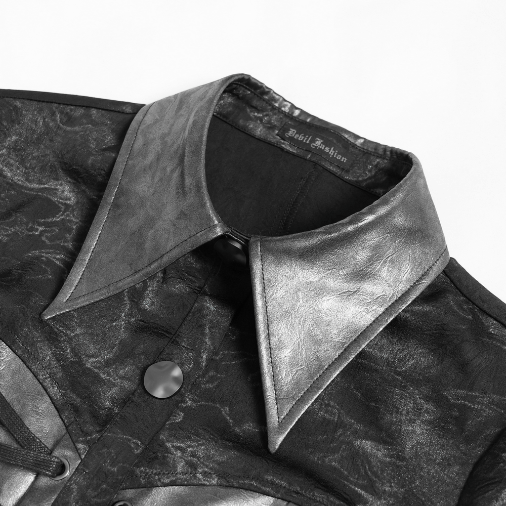 Close-up of a gothic black lace-up shirt with metallic collar detailing and button-up front, showcasing punk-inspired style.