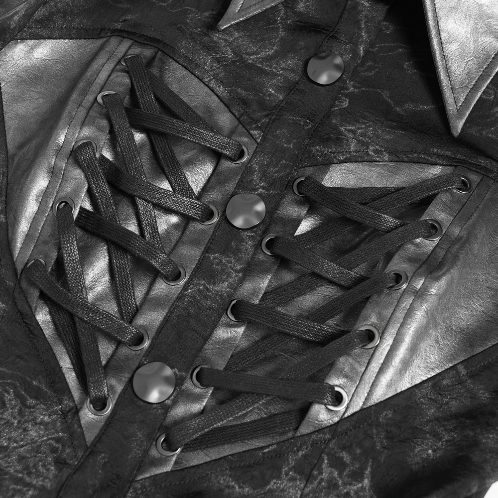 Close-up of gothic black lace-up shirt with silver detailing and structured collar, showcasing punk-inspired design.