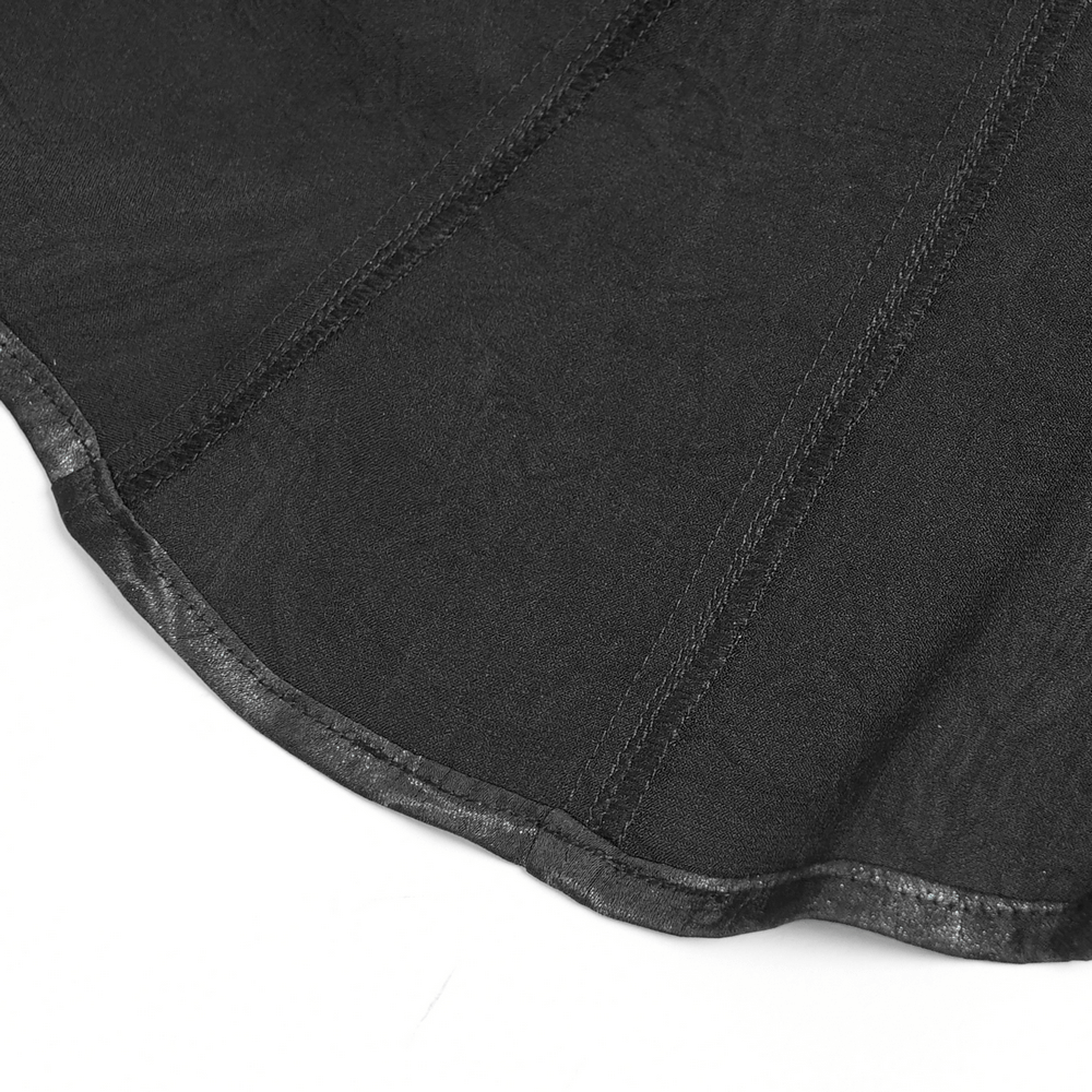 Close-up of the hem of a gothic black lace-up shirt showcasing its textured fabric and detailed stitching.