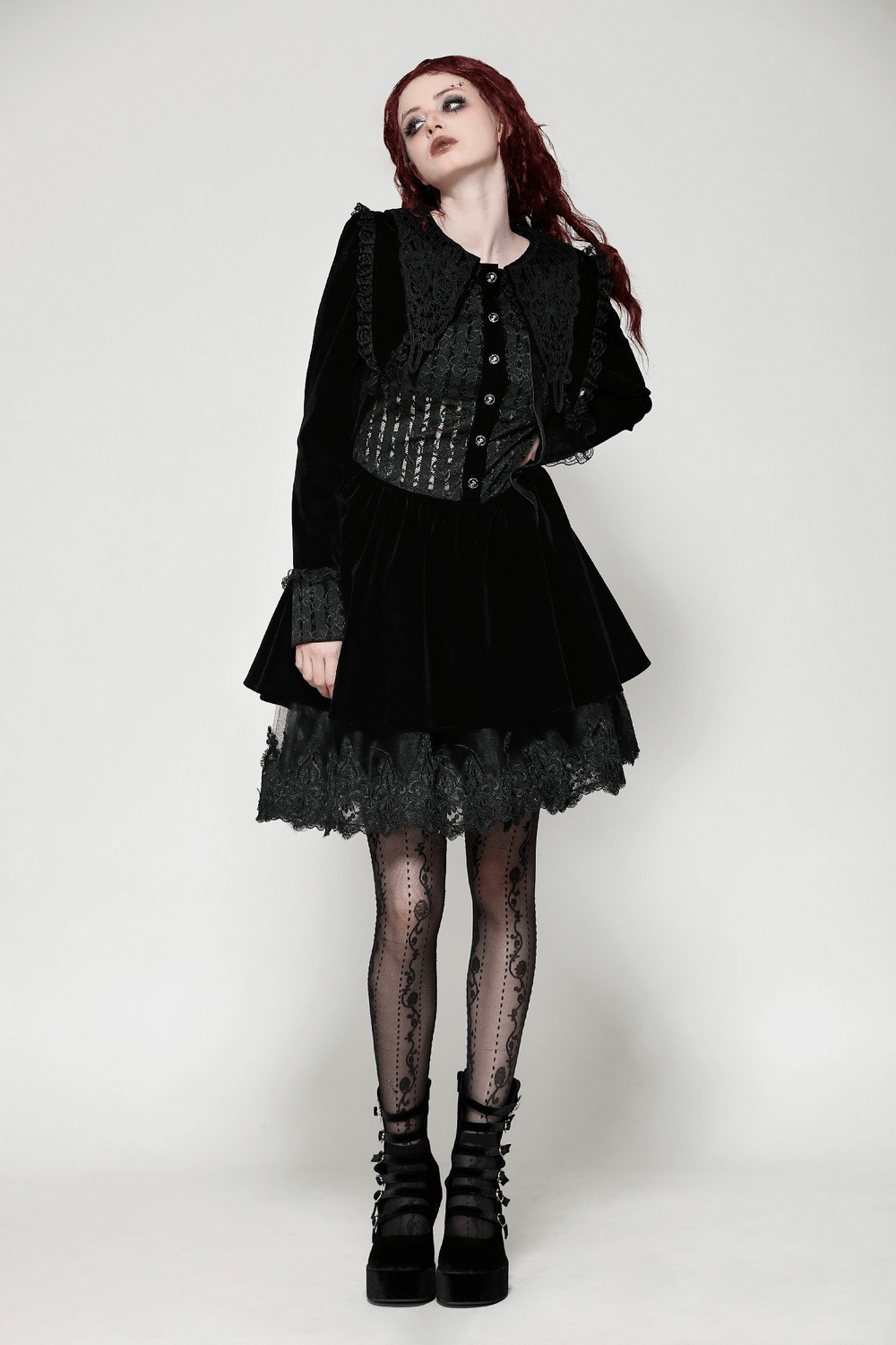 Gothic black lace velvet dress with button details, featuring a structured bodice and elegant lace trim. Perfect for Victorian-inspired looks.