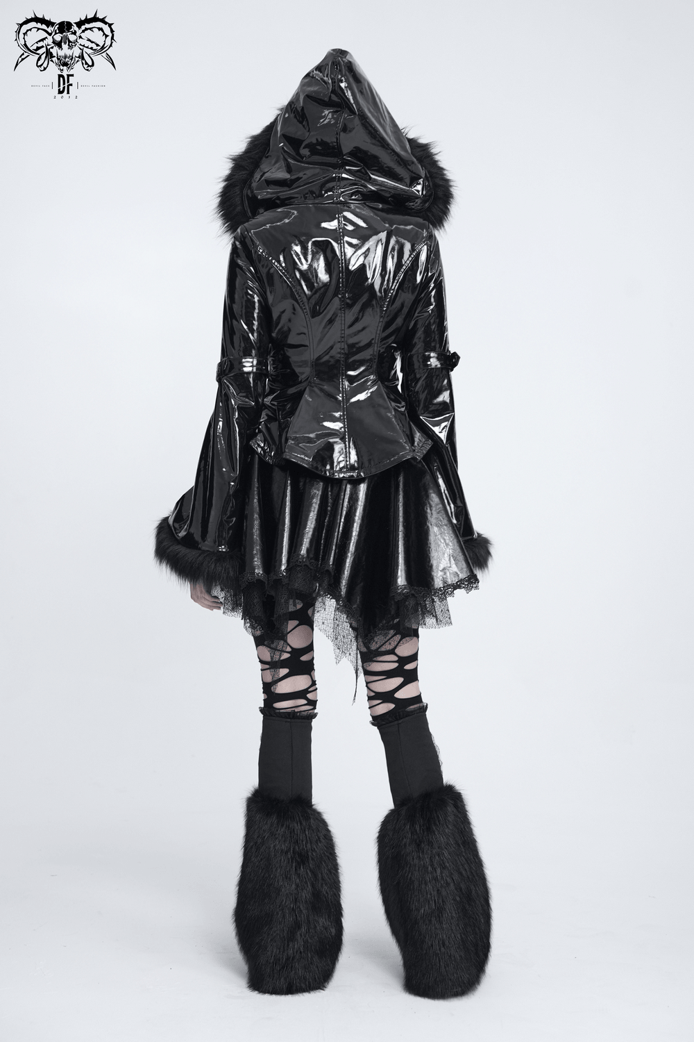 Gothic Black Leg Warmers with Chain Hardware Detail worn with black shiny jacket and skirt in a stylish pose.
