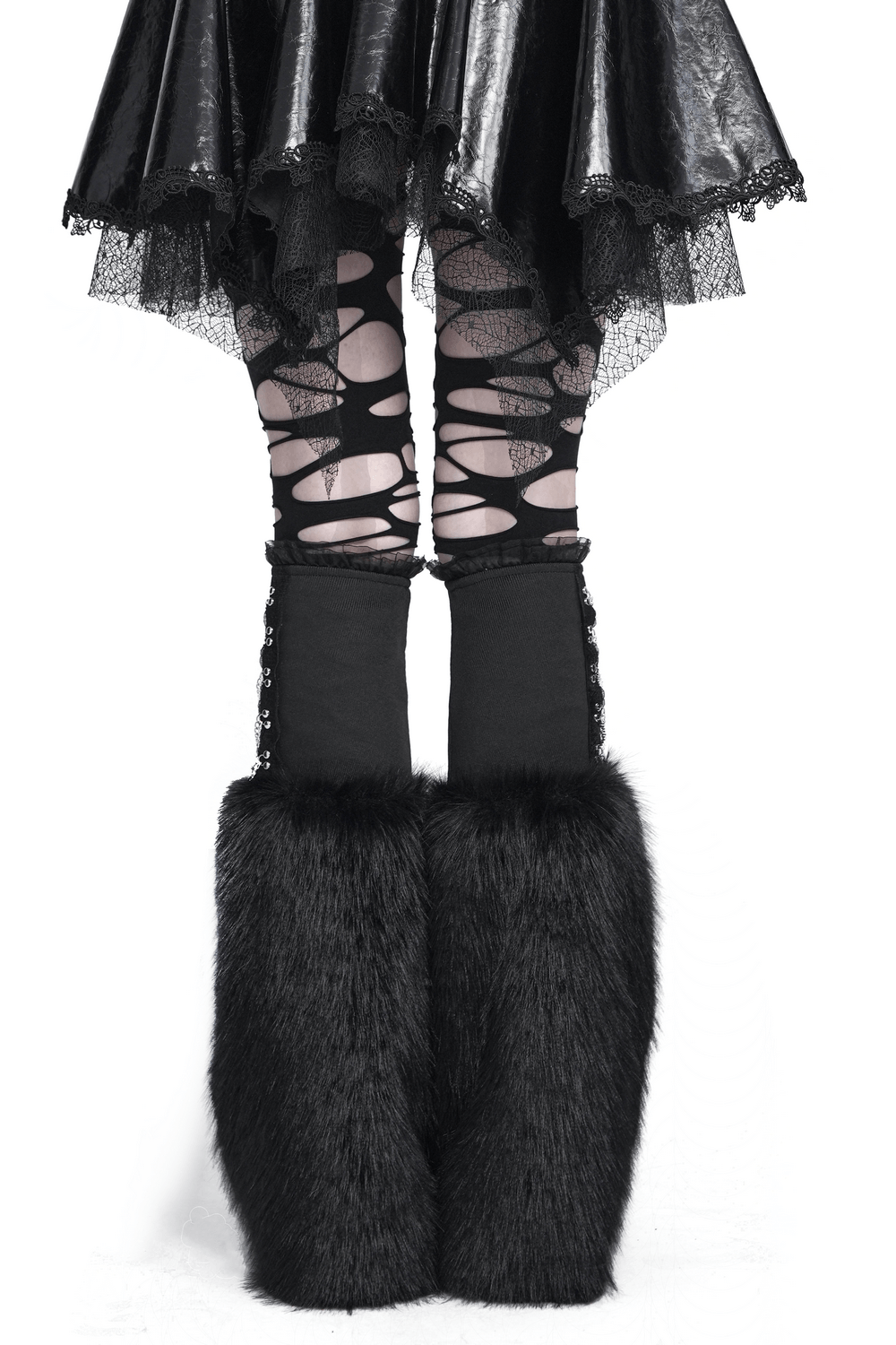 Gothic Black Leg Warmers with Chain Hardware Detail, featuring fur accents, stylishly worn with a black skirt.