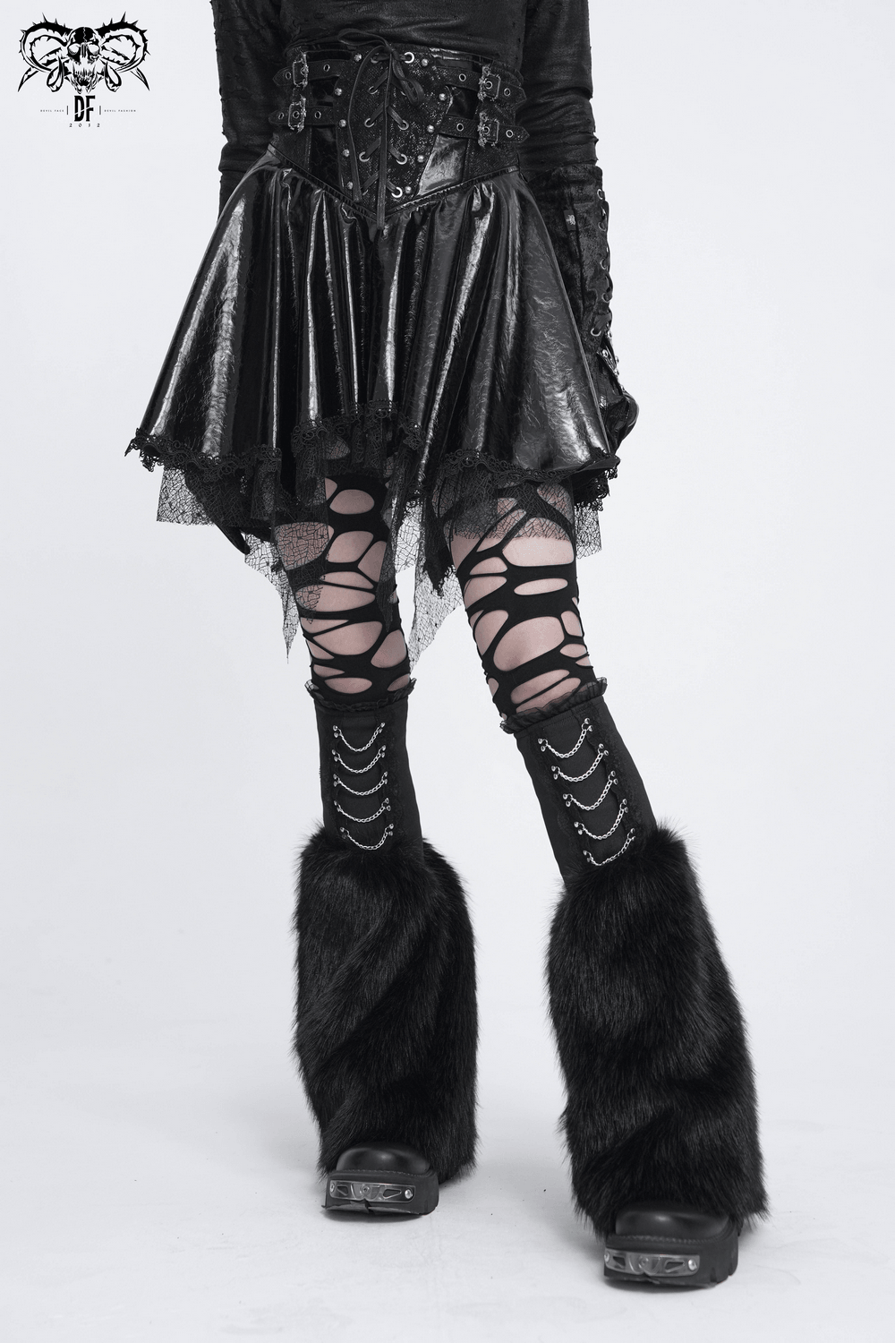 Gothic Black Leg Warmers with Chain Hardware Detail paired with a stylish black dress and edgy leggings.