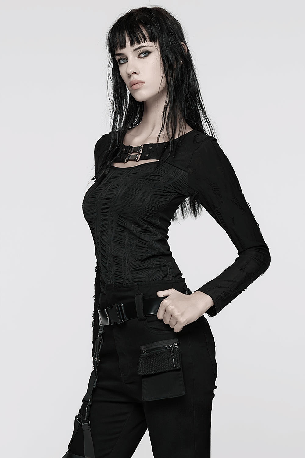 Gothic Black Long Sleeve Top with Buckle Chest Detail showcased with sleek streetwear style.
