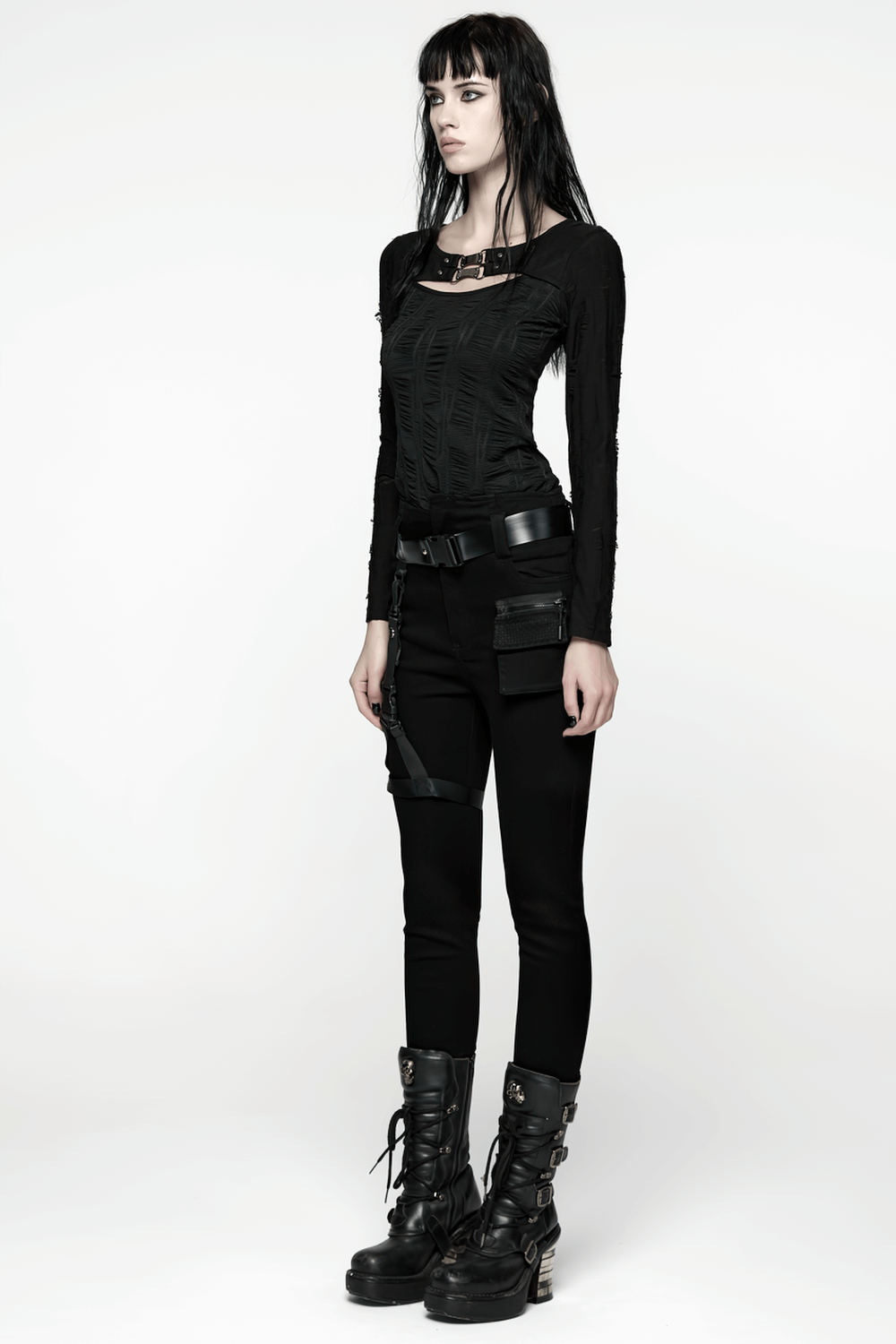 Gothic Black Long Sleeve Top with Buckle Chest Detail worn with edgy black pants and combat boots.