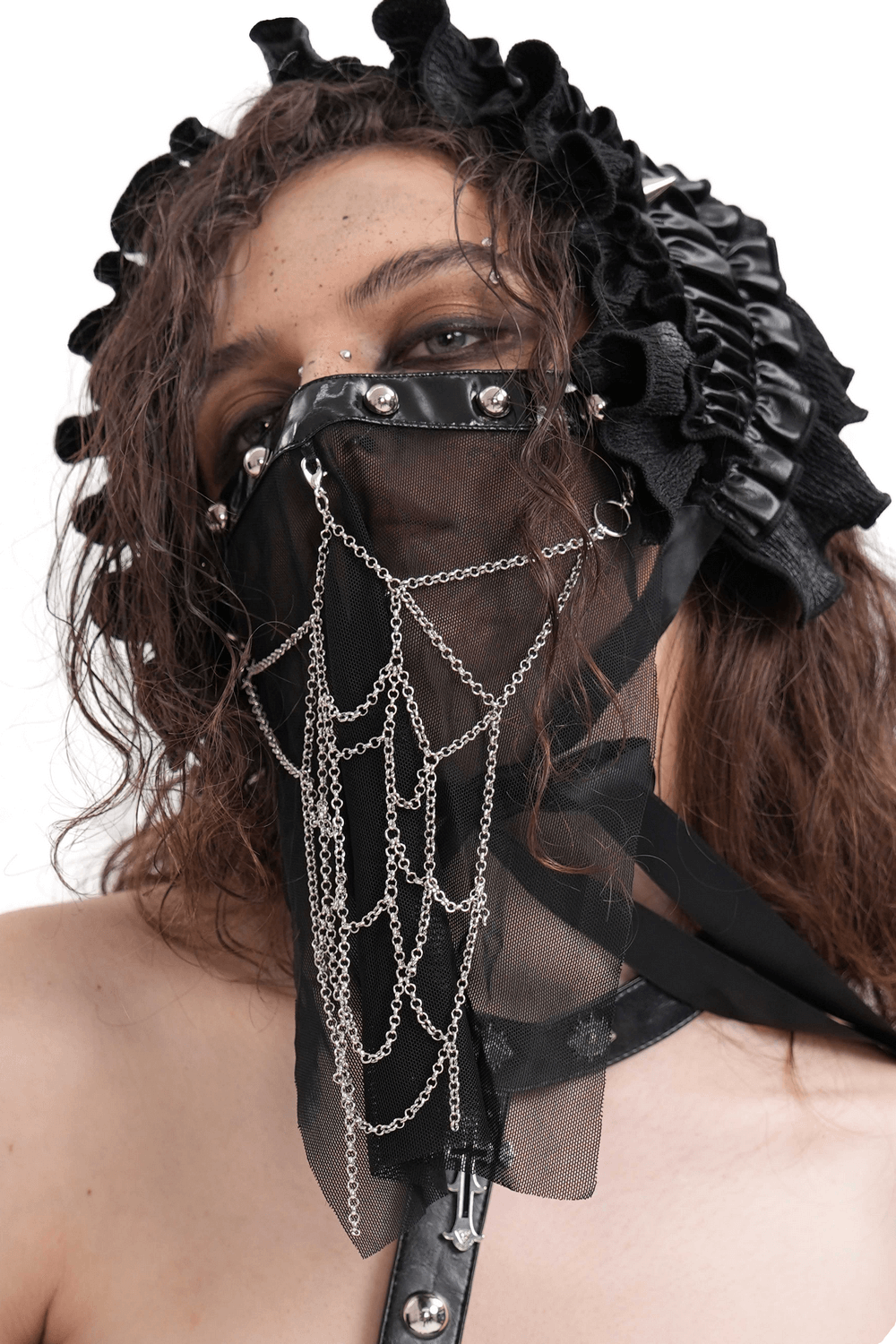 Gothic black mesh face veil with silver studs and chains for an edgy punk look.