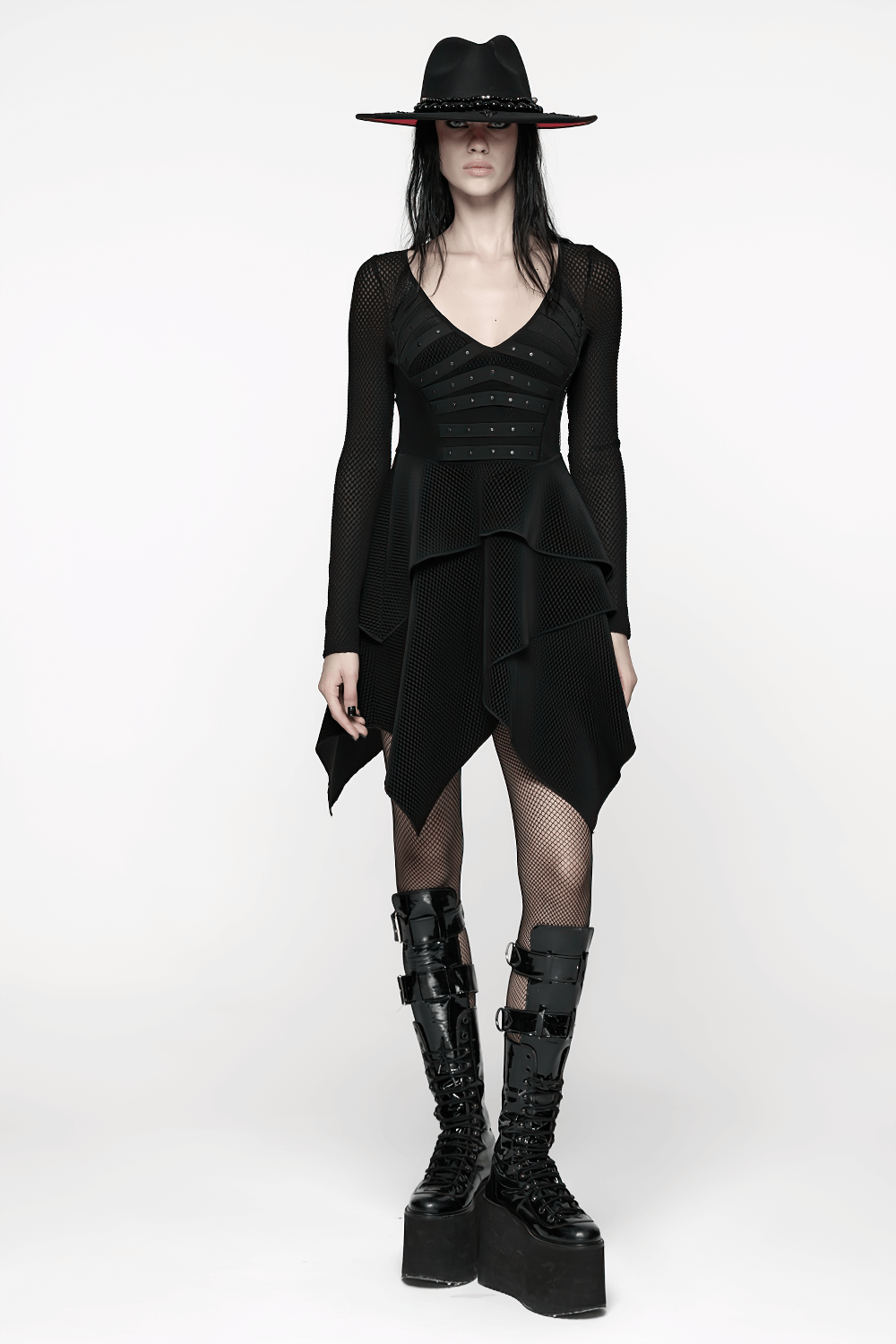 Gothic Black Mesh Dress with Rivet Waist and Layered Hem styled with edgy accessories and platform boots.