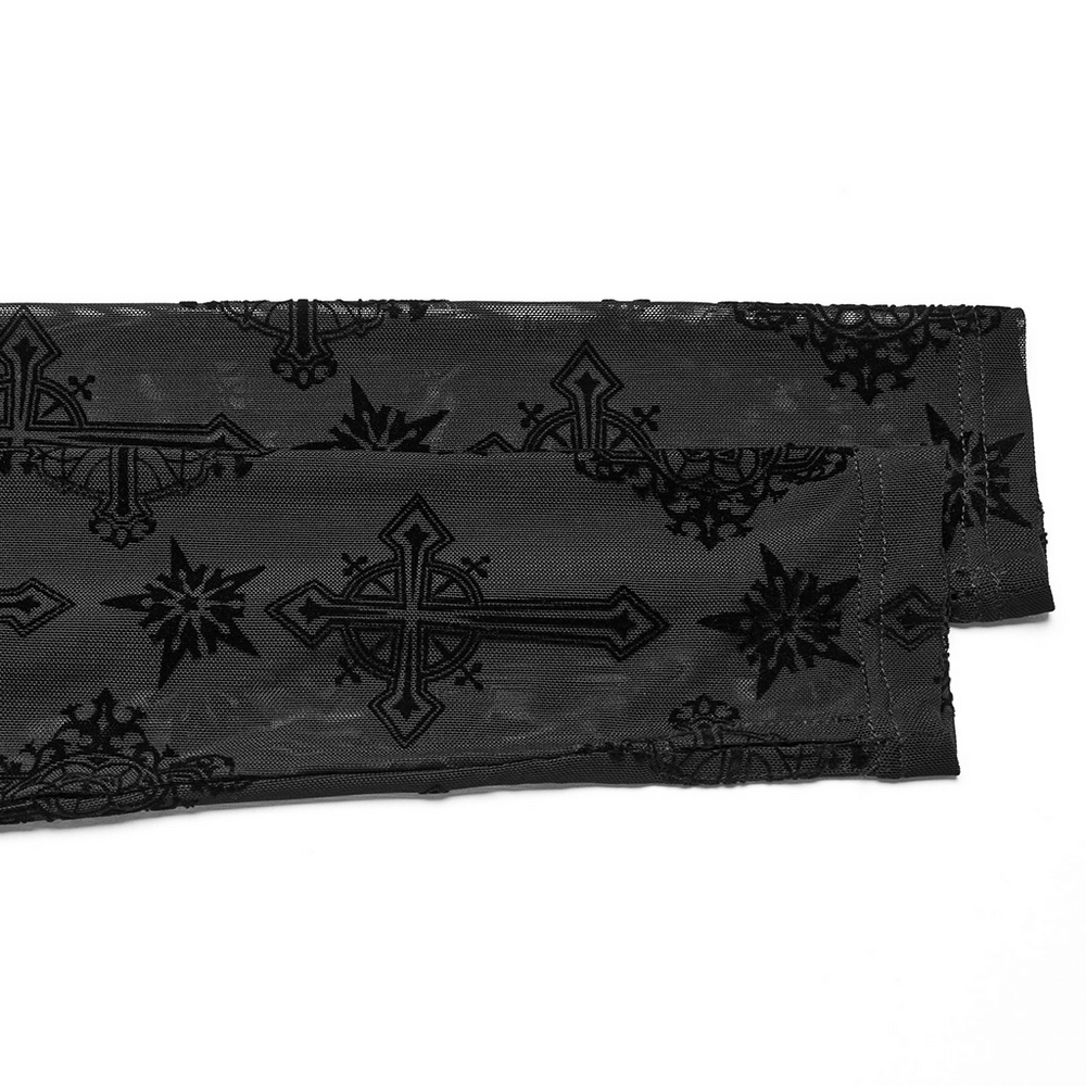 Close-up of black mesh fabric featuring intricate cross embroidery patterns, perfect for gothic fashion lovers.