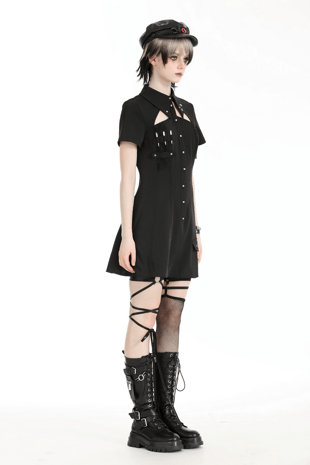Gothic black mini dress with studs, short sleeves, cut-out design, and stylish combat boots.