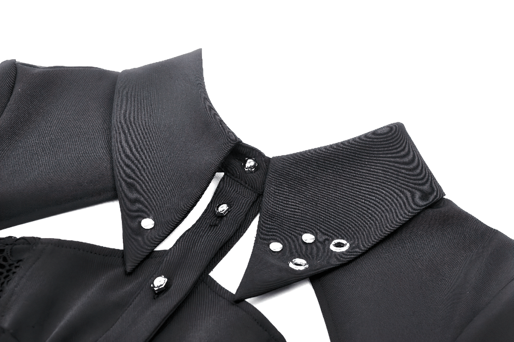 Close-up view of black mini dress collar with metal studs, showcasing edgy gothic fashion details.