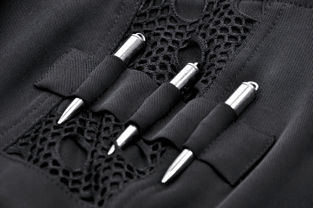 Close-up of metal studded details on Gothic black mini dress, featuring unique cut-out design and stylish pockets.
