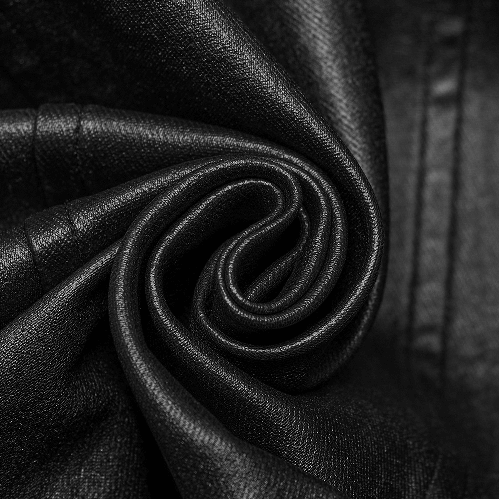 Close-up of black patent leather fabric with a luxurious sheen and smooth texture, perfect for stylish gothic clothing.