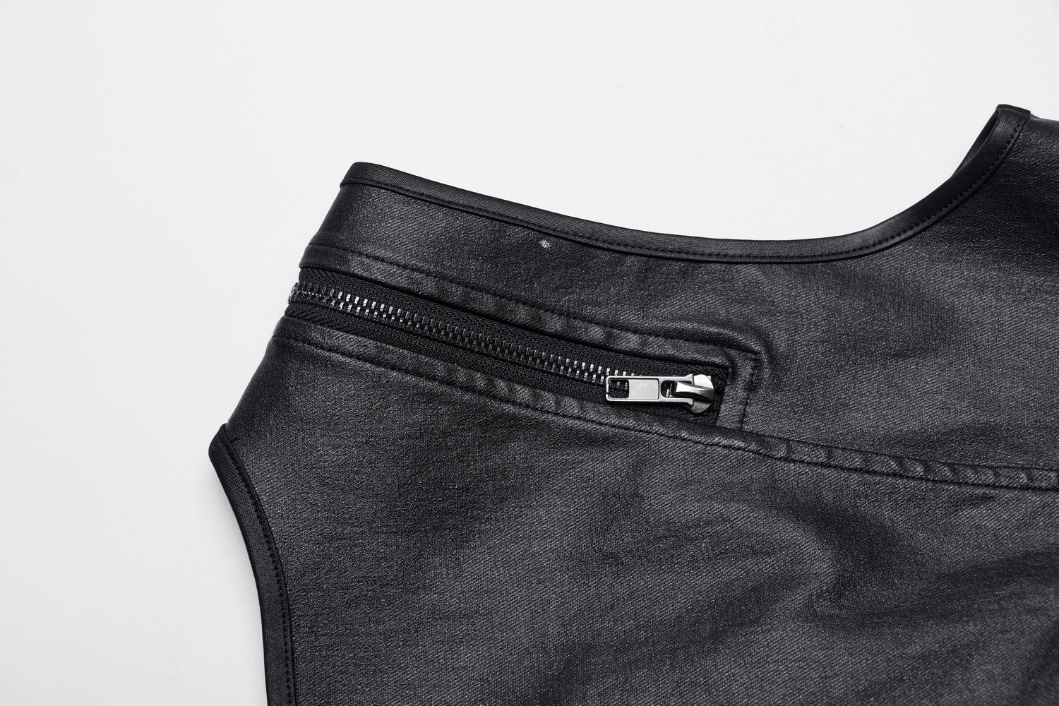 Close-up of a gothic black patent leather dress zipper, showcasing sleek style and practicality.