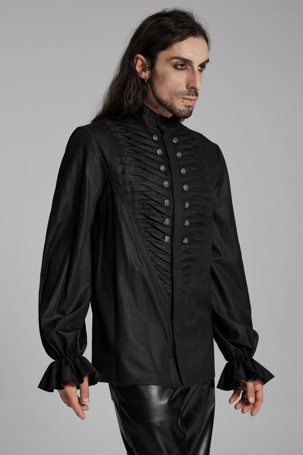 Gothic black pleated shirt with metal beast head buttons and ruffled cuffs for a sophisticated dark wardrobe.